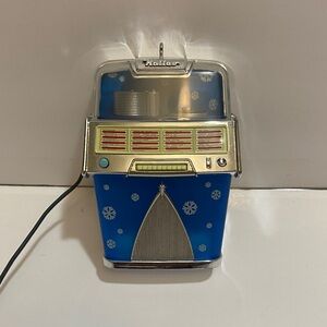 2013 jolly jukebox light and sound ornament in original box